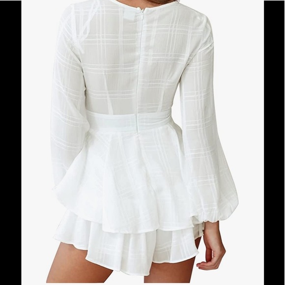 White romper with sheer long sleeves, ruffle hem, and front tie - Picture 2 of 2